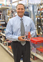 George Davison with the product invention Add-A-Signal on the store shelf