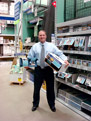 Mr. Davison, Founder and CEO, shown with product on the store shelf
