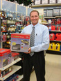 George with Davison Produced Product Invention CIPA Optic Glow Mirror in the store it's selling in.
