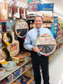 George Davison with Davison Produced Product Invention The Perfect Pizza Pan in the store it's selling in