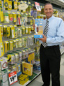 George Davison with product invention Petite Press in the store