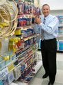 George Davison with product invention Ultimate Stiletto in the store