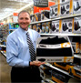 Mr. Davison (aka Mr. D) with Product Invention Back of Gel Seat Cushion Packaging