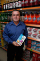 Inventor with Can Pump and Pour in the store it's selling in.
